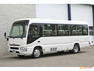 Toyota Coaster Bus Rental - Excellent Quality and Performance for All Trips with New Year Offers